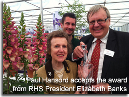 Paul Hansord accepts award from RHS President Elizabeth Banks
