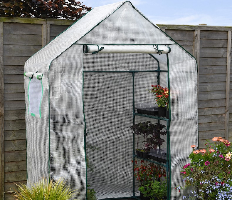 Polycarbonate portable greenhouse with doors open