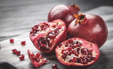 Pomegranate on wooden table