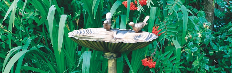 Pewter bird bath with metal birds