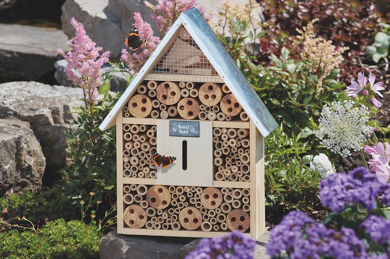 Insect hotel with butterfly